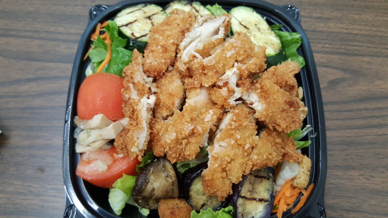 Original chicken salad in a takeaway container